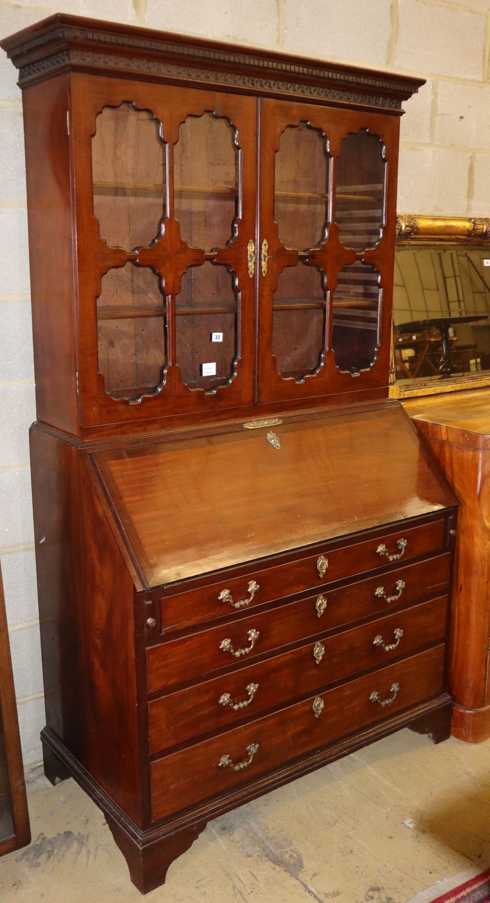 A George III mahogany bureau bookcase, W.107cm, D.56cm, H.196cm